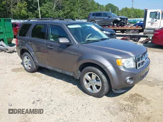 2011 Ford Escape XLT with VIN 1FMCU9DG0BKB70083, listed as a IAAI auction lot 42499807 with 143,312 mi miles and . Bid and sale history available at DreamBid. Image 1.