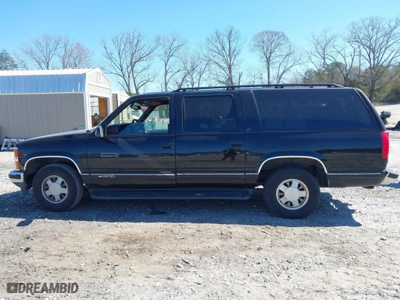 1999 Chevrolet Suburban with VIN 3GNEC16R0XG137834, listed as a IAAI auction lot 41853492 with 296,147 mi miles. Bid and sale history available at carsss.com. Image 14.