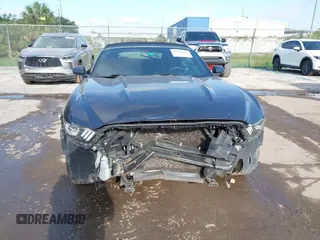 2017 Ford Mustang V6 z VIN 1FATP8EM0H5217314, wystawiony jako IAAI lot #42296116 z przebiegiem 104 845 mil mil oraz . Historia ofert i sprzedaży dostępna na DreamBid. Obrazek 6.