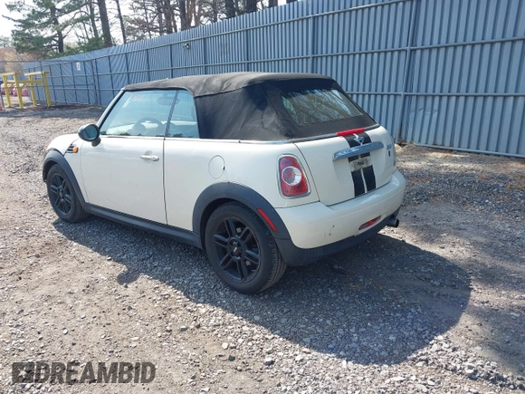 2013 MINI Convertible with VIN WMWZN3C58DT135598, listed as a IAAI auction lot 42122817 with 120,638 mi miles and . Bid and sale history available at DreamBid. Image 3.