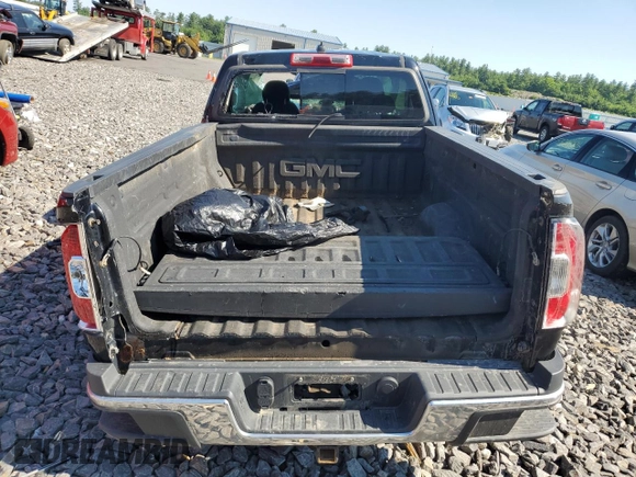 2015 GMC Canyon 2WD SLE z VIN 1GTH5BEA5F1190091, wystawiony jako Copart lot #59672204 z przebiegiem Nie podano mil oraz Szkoda całkowita • Salvage title. Historia ofert i sprzedaży dostępna na DreamBid. Obrazek 6.