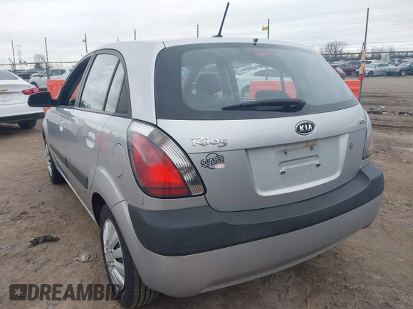 2009 Kia Rio LX with VIN KNADE243596544181, listed as a IAAI auction lot 41876733 with 200,216 mi miles. Bid and sale history available at carsss.com. Image 3.