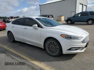 2018 Ford Fusion Titanium with VIN 3FA6P0D94JR247057, listed as a Copart auction lot 56916365 with 101,577 mi miles and Salvage title. Bid and sale history available at DreamBid. Image 4.