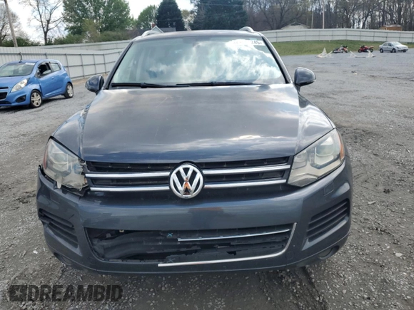 2012 Volkswagen Touareg Sport с VIN WVGEK9BP7CD006059, выставлен на аукционе Copart как лот 49411245 с пробегом 202 323 миль миль и Чистый • Clean title. История ставок и продаж доступна на DreamBid. Изображение 5.