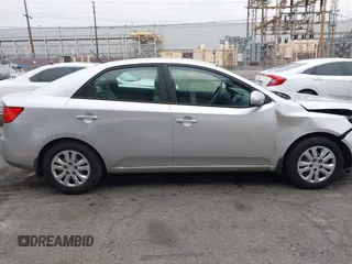 2013 Kia Forte LX with VIN KNAFT4A21D5739585, listed as a IAAI auction lot 42097213 with 195,500 mi miles. Bid and sale history available at carsss.com. Image 14.