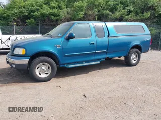 2000 Ford F-150 XL with VIN 1FTRX18W2YNC19493, listed as a IAAI auction lot 42127210 with 115,052 mi miles. Bid and sale history available at carsss.com. Image 2.
