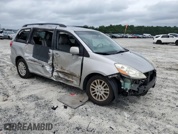 2010 Toyota Sienna XLE with VIN 5TDYK4CC1AS322395, listed as a Copart auction lot 60520215 with 148,725 mi miles and Salvage title. Bid and sale history available at DreamBid. Image 4.