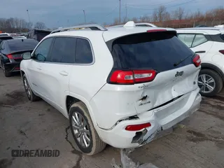 2018 Jeep Cherokee Overland with VIN 1C4PJMJX7JD594319, listed as a IAAI auction lot 41177860 with 128,925 mi miles. Bid and sale history available at carsss.com. Image 3.