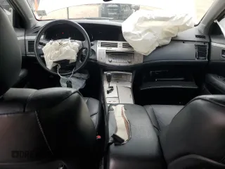2006 Toyota Avalon XL z VIN 4T1BK36B36U066018, wystawiony jako Copart lot #56701295 z przebiegiem 231 694 mil mil oraz Szkoda całkowita • Salvage title. Historia ofert i sprzedaży dostępna na DreamBid. Obrazek 8.