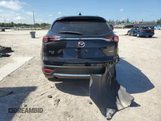 2021 Mazda CX-9 Sport with VIN JM3TCBBY6M0506576, listed as a Copart auction lot 56307514 with 36,310 mi miles and Salvage Title. Bid and sale history available at DreamBid. Image 6.