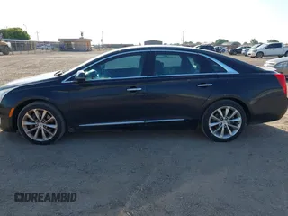 2014 Cadillac XTS Luxury with VIN 2G61M5S35E9228802, listed as a IAAI auction lot 42542501 with 106,506 mi miles and . Bid and sale history available at DreamBid. Image 14.