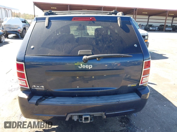 2009 Jeep Grand Cherokee Laredo with VIN 1J8HR48P19C540785, listed as a IAAI auction lot 41729851 with 205,504 mi miles. Bid and sale history available at carsss.com. Image 16.