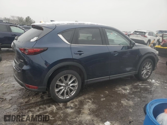 2021 Mazda CX-5 Grand Touring with VIN JM3KFBDM0M0391325, listed as a Copart auction lot 44863215 with 21,997 mi miles and Salvage Title. Bid and sale history available at DreamBid. Image 3.