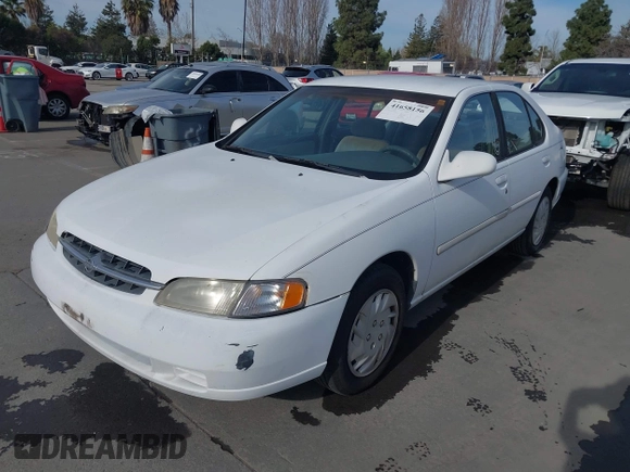 1998 Nissan Altima XE with VIN 1N4DL01D8WC165818, listed as a IAAI auction lot 41658156 with 184,843 mi miles. Bid and sale history available at carsss.com. Image 6.