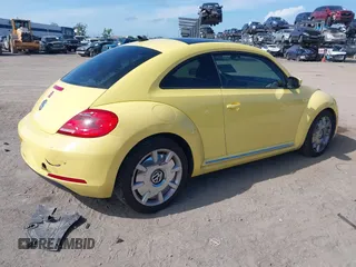 2012 Volkswagen Beetle 2.5L with VIN 3VWJX7AT9CM651806, listed as a IAAI auction lot 41912080 with 143,195 mi miles. Bid and sale history available at carsss.com. Image 4.