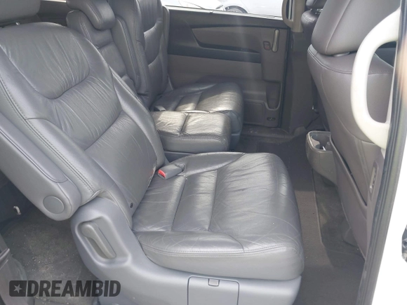 2011 Honda Odyssey Touring with VIN 5FNRL5H90BB066177, listed as a IAAI auction lot 42053368 with 239,205 mi miles and . Bid and sale history available at DreamBid. Image 8.
