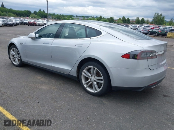 2014 Tesla Model S 60 with VIN 5YJSA1S13EFP53662, listed as a IAAI auction lot 42249930 with Not provided miles and . Bid and sale history available at DreamBid. Image 3.