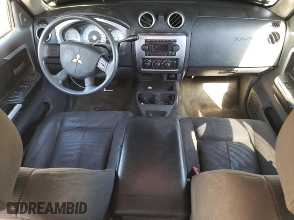 2007 Mitsubishi Raider LS z VIN 1Z7HT28K57S234309, wystawiony jako Copart lot #75505104 z przebiegiem 210 964 mil mil oraz Szkoda całkowita • Salvage title. Historia ofert i sprzedaży dostępna na DreamBid. Obrazek 8.