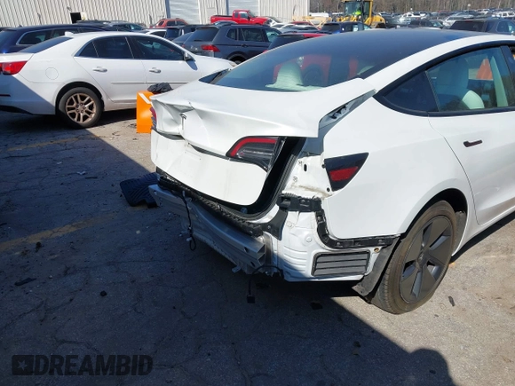 2022 Tesla Model 3 with VIN 5YJ3E1EA7NF103513, listed as a IAAI auction lot 41643592 with 35,631 mi miles and . Bid and sale history available at DreamBid. Image 20.