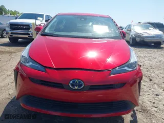 2021 Toyota Prius L Eco with VIN JTDKAMFU3M3138708, listed as a IAAI auction lot 42006401 with 38,876 mi miles. Bid and sale history available at carsss.com. Image 13.
