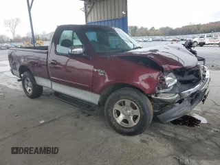 1999 Ford F-150 XL with VIN 2FTRF17L0XCB19827, listed as a Copart auction lot 85282164 with 52,103 mi miles and Salvage title. Bid and sale history available at DreamBid. Image 4.