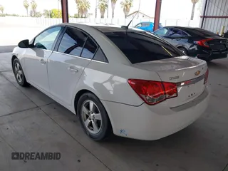 2014 Chevrolet Cruze 1LT with VIN 1G1PC5SB2E7226761, listed as a IAAI auction lot 42029133 with 153,738 mi miles and . Bid and sale history available at DreamBid. Image 3.
