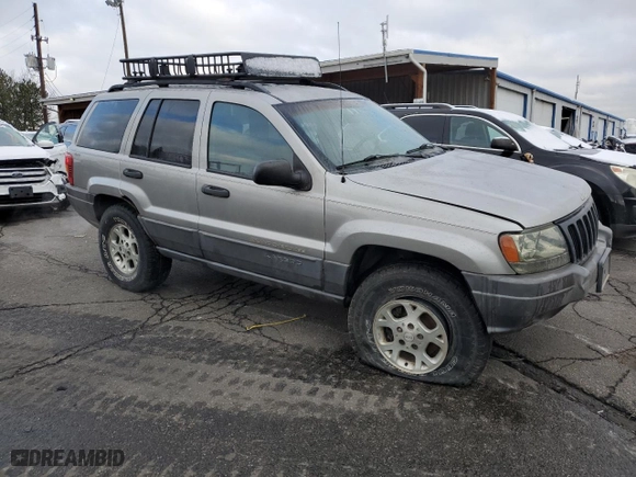 2001 Jeep Grand Cherokee Laredo with VIN 1J4GW48SX1C607432, listed as a Copart auction lot 51649365 with 296,308 mi miles and Salvage Title. Bid and sale history available at carsss.com. Image 4.