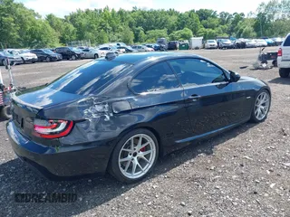 2011 BMW 3 Series 335i xDrive with VIN WBAKF9C56BE247125, listed as a IAAI auction lot 39738395 with 144,405 mi miles. Bid and sale history available at carsss.com. Image 4.