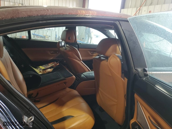 2016 BMW 6 Series 650i xDrive with VIN WBA6D6C55GGF94711, listed as a Copart auction lot 52917475 with 103,965 mi miles and Non Repairable. Bid and sale history available at carsss.com. Image 10.