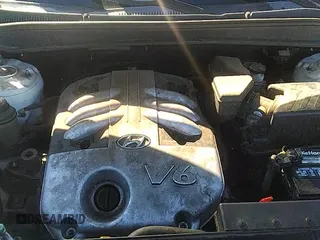 2007 Hyundai Santa Fe SE z VIN 5NMSH73E37H066098, wystawiony jako IAAI lot #43111802 z przebiegiem 167 222 mil mil oraz . Historia ofert i sprzedaży dostępna na DreamBid. Obrazek 19.