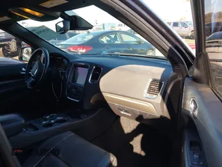 2015 Dodge Durango R/T with VIN 1C4SDHCT5FC937676, listed as a IAAI auction lot 41369508 with 107,075 mi miles and . Bid and sale history available at DreamBid. Image 5.