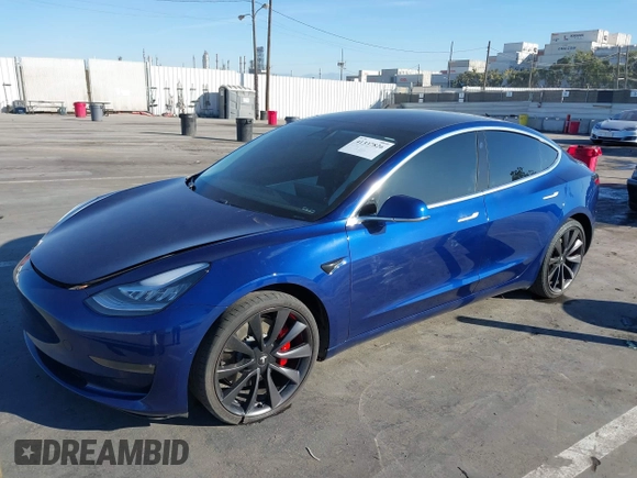 2020 Tesla Model 3 Performance z VIN 5YJ3E1ECXLF641945, wystawiony jako IAAI lot #41337826 z przebiegiem 53 336 mil mil oraz . Historia ofert i sprzedaży dostępna na DreamBid. Obrazek 19.