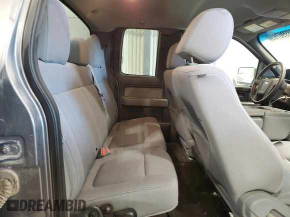 2012 Ford F-150 XL with VIN 1FTFX1EF5CFA86643, listed as a Copart auction lot 88990785 with 149,922 mi miles and Salvage title. Bid and sale history available at DreamBid. Image 11.