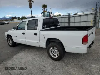 2001 Dodge Dakota Sport with VIN 1B7GL2AN21S131366, listed as a Copart auction lot 81263154 with 272,938 mi miles and Salvage Title. Bid and sale history available at DreamBid. Image 2.