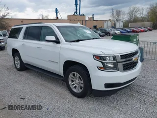 2019 Chevrolet Suburban LT with VIN 1GNSKHKCXKR369575, listed as a IAAI auction lot 41909451 with 117,331 mi miles and . Bid and sale history available at DreamBid. Image 1.