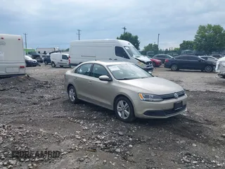 2013 Volkswagen Jetta Hybrid SE with VIN 3VW637AJ3DM309706, listed as a IAAI auction lot 42700628 with 81,794 mi miles and . Bid and sale history available at DreamBid. Image 1.