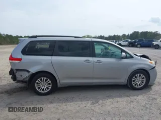 2012 Toyota Sienna XLE AAS with VIN 5TDYK3DC4CS251821, listed as a IAAI auction lot 41932724 with 149,395 mi miles. Bid and sale history available at carsss.com. Image 13.