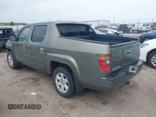 2007 Honda Ridgeline RTL with VIN 2HJYK16517H513832, listed as a IAAI auction lot 42626411 with 209,171 mi miles and . Bid and sale history available at DreamBid. Image 3.