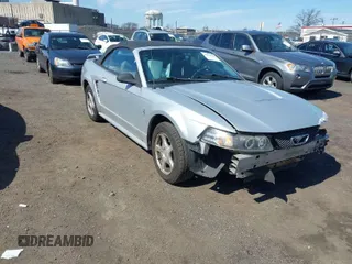 2003 Ford Mustang Deluxe z VIN 1FAFP44463F447563, wystawiony jako IAAI lot #41810940 z przebiegiem 88 590 mil mil oraz . Historia ofert i sprzedaży dostępna na DreamBid. Obrazek 1.