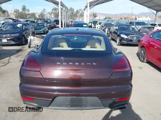 2015 Porsche Panamera 4 z VIN WP0AA2A76FL000746, wystawiony jako IAAI lot #41411279 z przebiegiem 37 496 mil mil oraz . Historia ofert i sprzedaży dostępna na DreamBid. Obrazek 16.