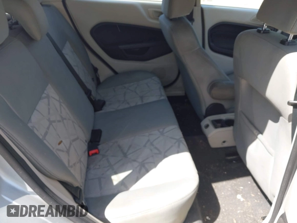 2013 Ford Fiesta SE with VIN 3FADP4EJ3DM136332, listed as a IAAI auction lot 42142556 with 69,979 mi miles and . Bid and sale history available at DreamBid. Image 8.