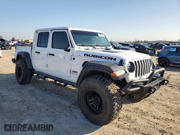 2022 Jeep Gladiator Rubicon with VIN 1C6JJTBG6NL142413, listed as a Copart auction lot 86098244 with 20,750 mi miles and Salvage title. Bid and sale history available at DreamBid. Image 4.