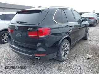 2015 BMW X5 sDrive35i z VIN 5UXKR2C54F0H35091, wystawiony jako IAAI lot #41621452 z przebiegiem 92 919 mil mil oraz . Historia ofert i sprzedaży dostępna na DreamBid. Obrazek 4.