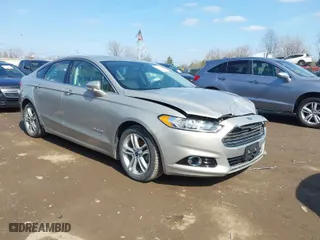 2016 Ford Fusion Titanium Hybrid with VIN 3FA6P0RU5GR171287, listed as a IAAI auction lot 41918195 with 74,721 mi miles. Bid and sale history available at carsss.com. Image 1.