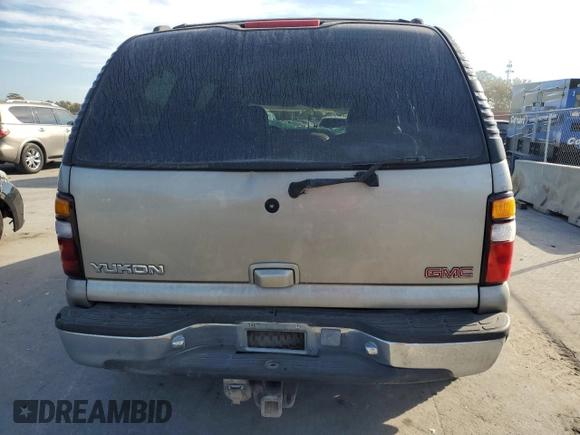 2000 GMC Yukon SLE with VIN 1GKEK13T2YJ130870, listed as a Copart auction lot 82887054 with 310,765 mi miles and Salvage Title. Bid and sale history available at carsss.com. Image 6.