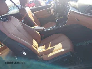 2014 BMW 4 Series 428i with VIN WBA3V7C59EJ872576, listed as a IAAI auction lot 41997699 with Not provided miles and . Bid and sale history available at DreamBid. Image 5.