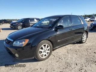 2005 Kia Spectra with VIN KNAFE161355073968, listed as a Copart auction lot 84543784 with 166,858 mi miles and Salvage Title. Bid and sale history available at carsss.com. Image 1.