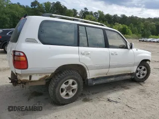1999 Toyota Land Cruiser z VIN JT3HT05J5X0050404, wystawiony jako Copart lot #56066125 z przebiegiem 385 659 mil mil oraz Tytuł czysty. Historia ofert i sprzedaży dostępna na DreamBid. Obrazek 3.