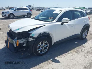 2016 Mazda CX-3 Touring with VIN JM1DKBC71G0126040, listed as a IAAI auction lot 41860285 with 97,986 mi miles and . Bid and sale history available at DreamBid. Image 2.