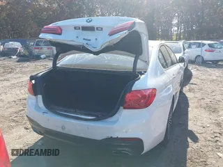 2018 BMW 5 Series 530i xDrive with VIN WBAJA7C58JG907988, listed as a IAAI auction lot 38011708 with Not provided miles and . Bid and sale history available at DreamBid. Image 15.